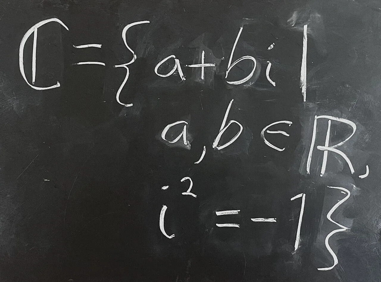 A definition of the complex numbers in terms of the real numbers, where the sets of complex and real numbers are indicated using 'blackboard bold' symbols.